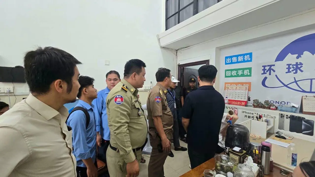 华人在金边被查,6名柬员工接受教育,电子设备经营要小心 — 封面